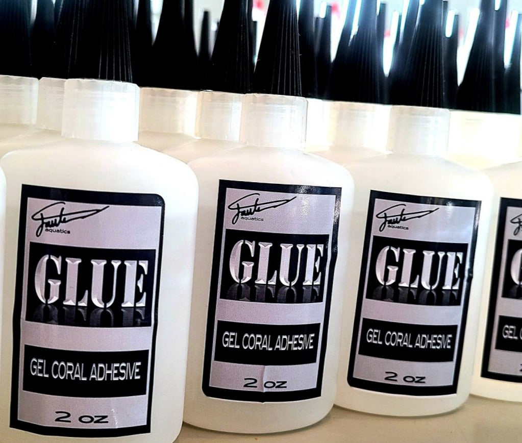 Multiple bottles of Gel Coral Adhesive by Fauth Aquatics, each bottle is 2 oz.